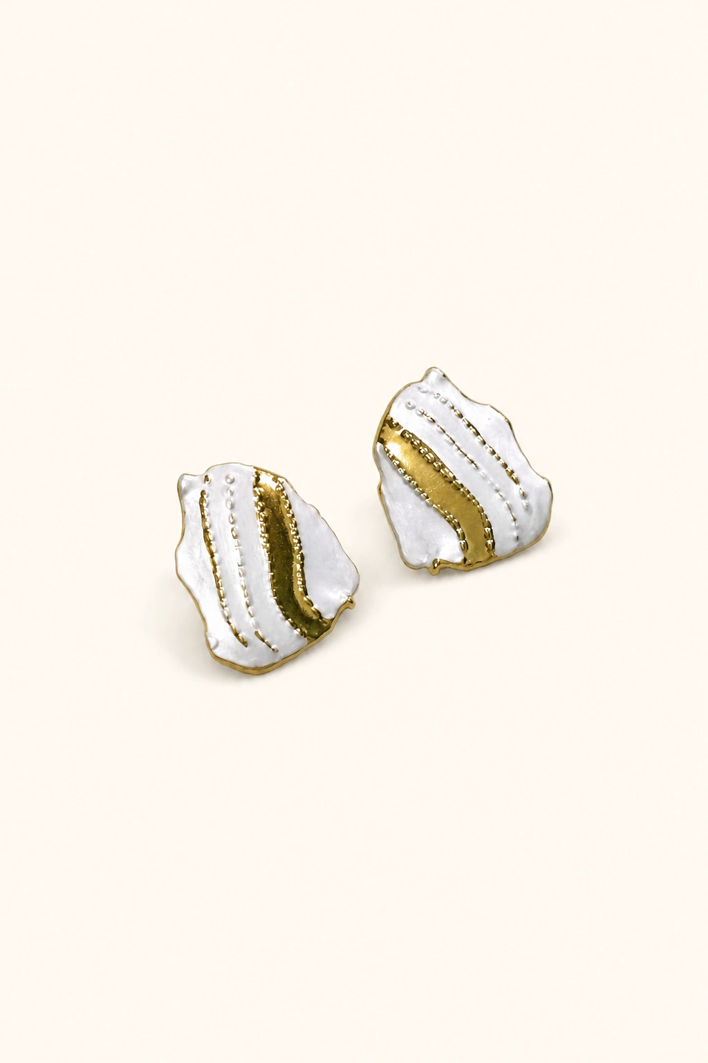 gold/white earrings